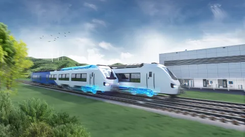 rendering of two trains in front of a test center